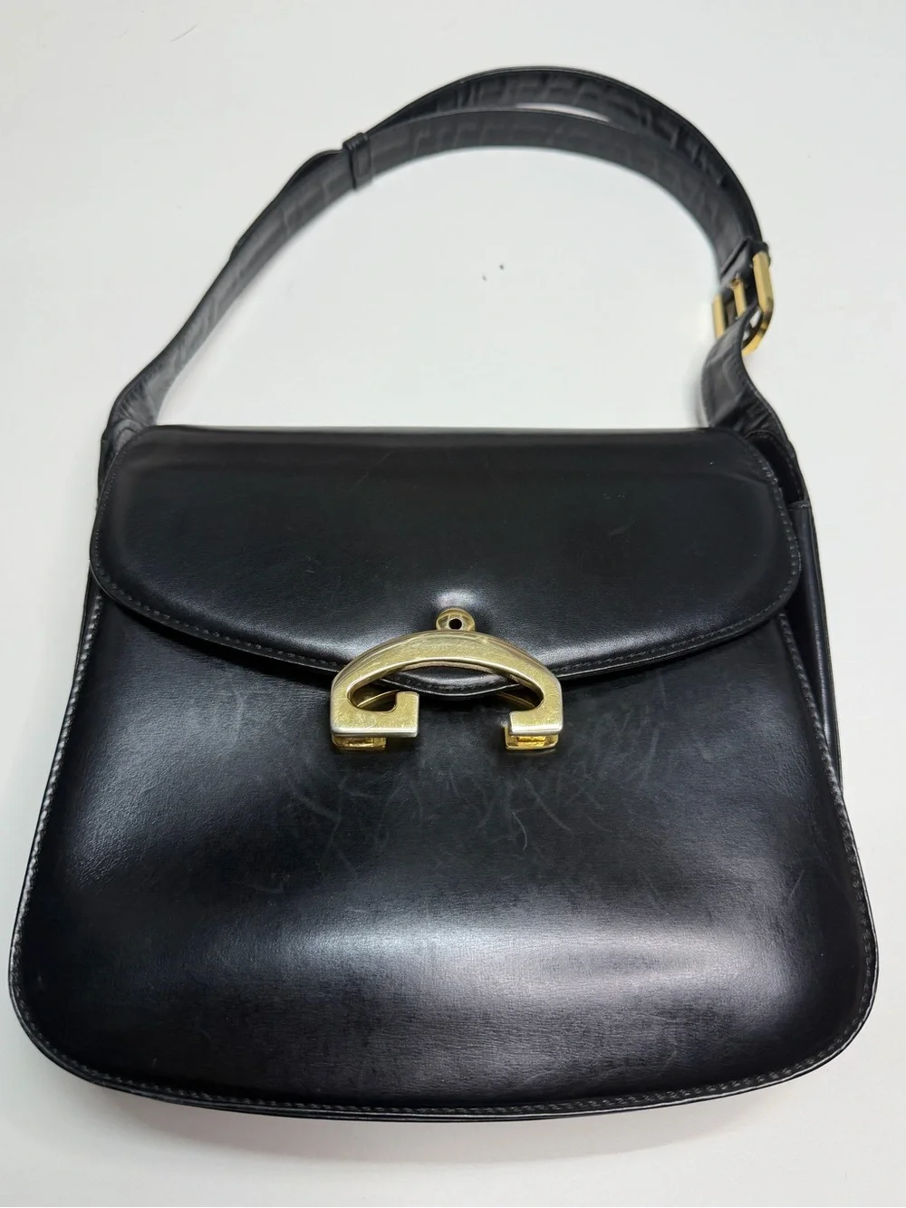 Gucci Black Leather Shoulder Bag with Gold-Tone Buckle